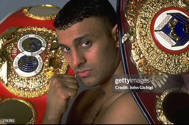 Portrait of Prince Naseem Hamed with the IBF and WBO belts Mandatory Credit: John Gichigi /Allsport