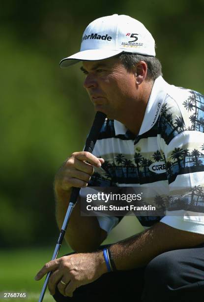 Kenny Perry of USA lines up his putt on the 11th green during the third round of The Nedbank Golf Challenge at The Gary Player Country Club on...