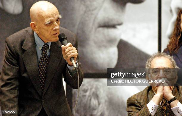 Brazilian writer Rubem Fonseca speaks with the press nex to Colombian Gabriel Garcia Marquez after receiving the 2003 Latin American and Caribbean...