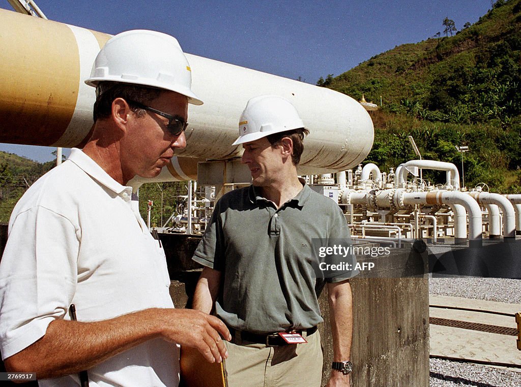 An unidentified official (L) of French o