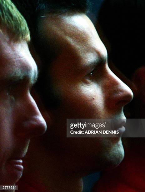 Manchester United's Ryan Giggs listens in to a press conference announcing a new sponsorship deal with Vodafone mobile phone company in London 01...