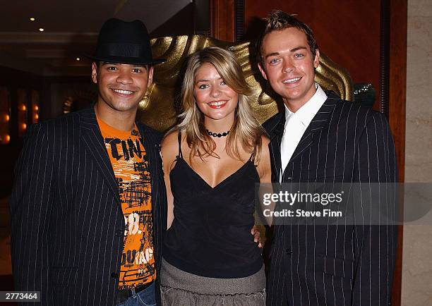 Presenters Michael Underwood, model Holly Willoughby and Stephen Mulhern arrive at the British Academy Children's Film And Television Awards in...