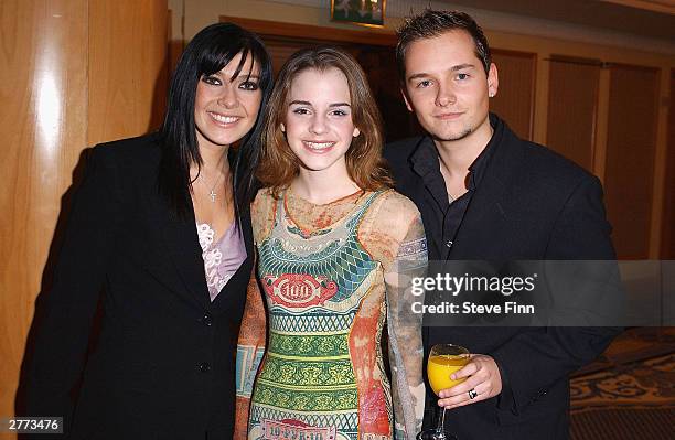 Singer Kym Marsh with her husband Jack Ryder and actress Emma Watson arrive at the British Academy Children's Film And Television Awards in...