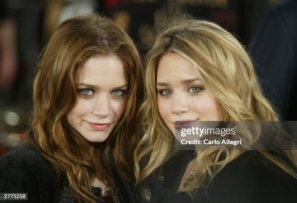 Actresses Mary-Kate and Ashley Olsen attend the WB's premiere of "The Last Samurai" held on December 1, 2003 at the Mann's Village Theatre, in Los...