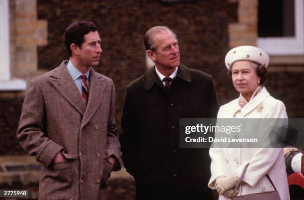 Prince Charles, Prince Philip the Duke of Edinburgh and the Queen on January 3, 1988 at Sandringham in Norfolk.