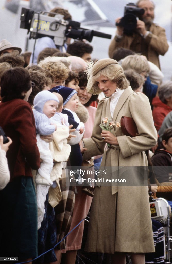 Diana Princess of Wales meets three babies on a walkabout through the city centre of Christchurch, New Zealand