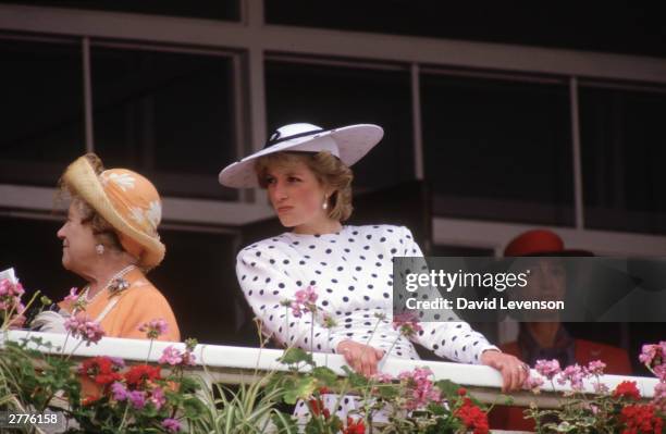 Diana Princess of Wales with the Queen Mother on the balcony of the Royal box, at the Derby on June 5, 1986 at Epsom racecourse in Surrey.