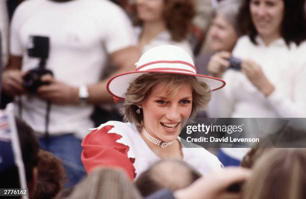 Diana Princess of Wales, on a walkabout through the crowd on April 6 in Port Pirie, Australia, during the Royal Tour of Australia. She wore an outfit...