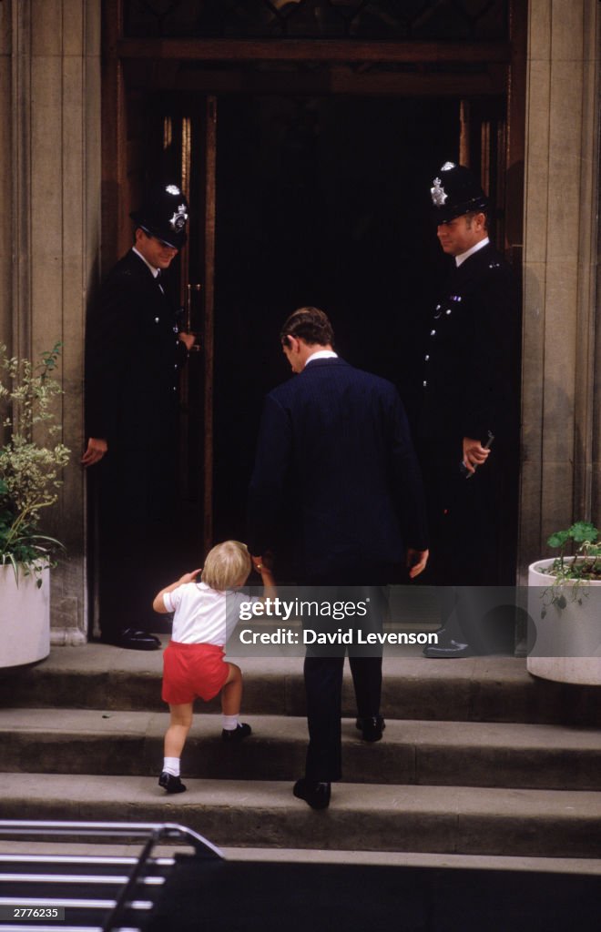 Prince William with Prince Charles, arrives at St. Mary's Hospital, Paddington