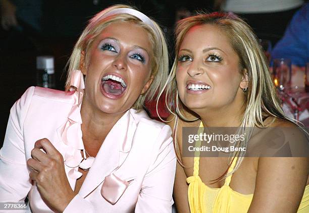 Nicole Richie and Paris Hilton during the premiere party for "The Simple Life" on December 2, 2003 at Bliss in Los Angeles, California.