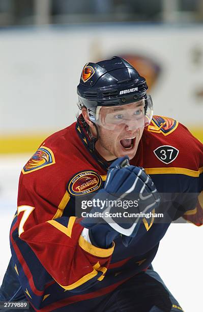 Ilya Kovalchuk of the Atlanta Thrashers reacts to a play during the game against the Boston Bruins on November 19, 2003 at Philips Arena in Atlanta,...