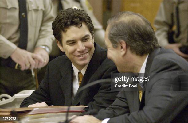 Scott Peterson sits with attorney Mark Geragos during arraignment proceedings at the Stanislaus Superior Court December 3, 2003 in Modesto,...