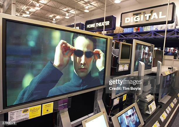 Wide-screen HD plasma television monitor for $8999.99 is displayed December 3, 2003 at a Best Buy store in Niles, Illinois. Electronics are the big...