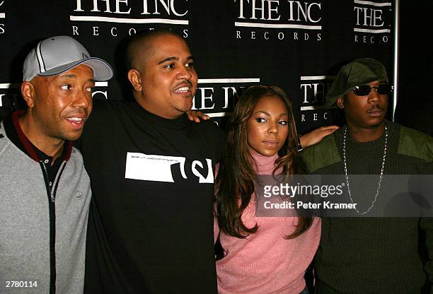Russell Simmons, Erv Gotti, Ashanti and Ja Rule at a press conference to announce Murder Inc. Records will now be called THE INC New York December 3,...