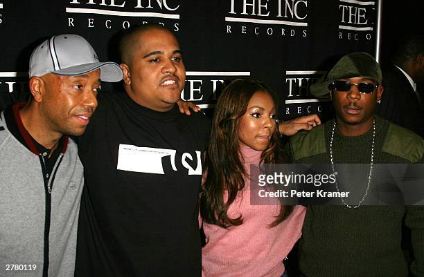 Russell Simmons, Erv Gotti, Ashanti and Ja Rule at a press conference to announce Murder Inc. Will now be called THE INC New York December 3, 2003 in...
