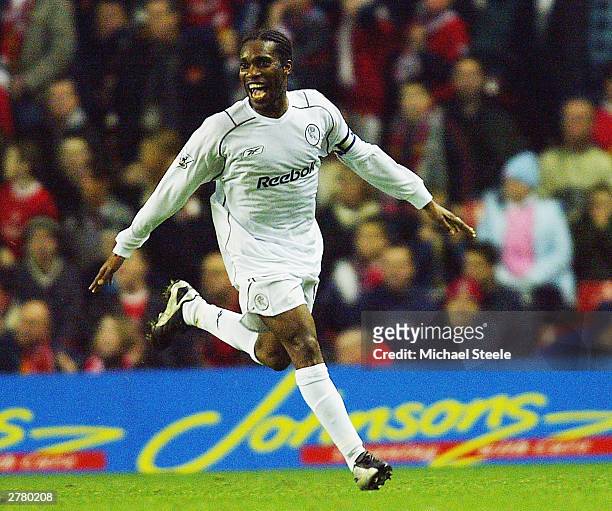 Jay Jay Okocha of Bolton celebrates after scoring the second goal with a free kick during the Carling Cup fourth round match between Liverpool and...