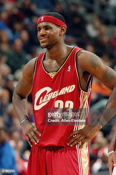 LeBron James of the Cleveland Cavaliers stands on the sidelines during the game against the Detroit Pistons at the Palace of Auburn Hills on November...