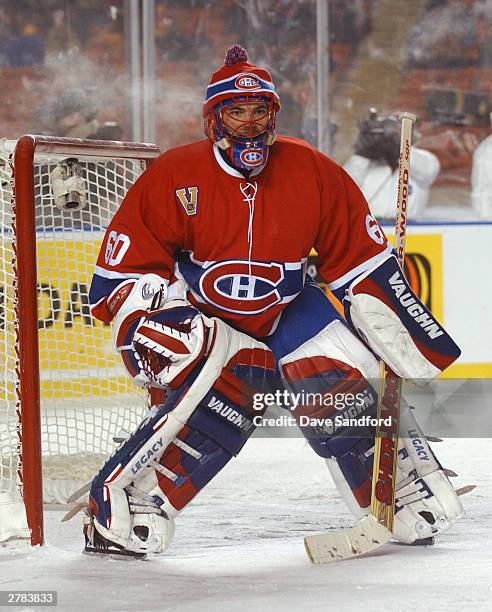 Goalie Jose Theodore of the Montreal Canadiens in the net during the game against the Edmonton Oilers at the Molson Canadien Heritage Classic on...