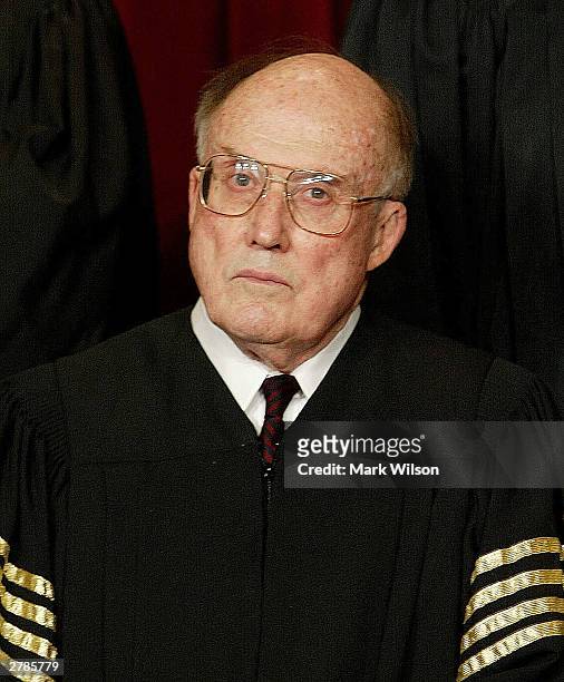 Supreme Court Chief Justice William Rehnquist poses for a picture at the US Supreme Court December 5, 2003 in Washington, DC.