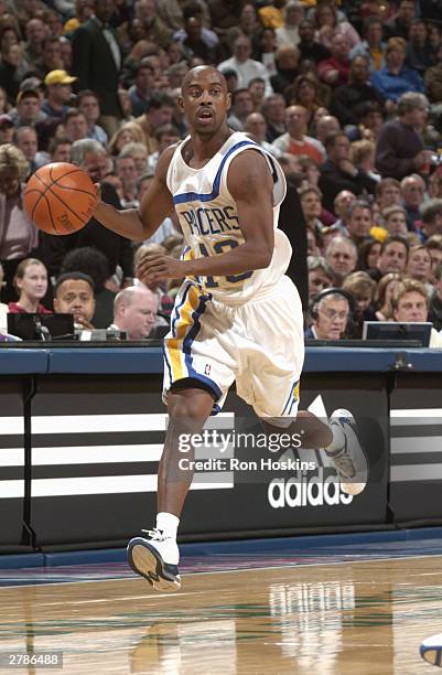 Kenny Anderson of the Indiana Pacers drives during the game against the New York Knicks at Conseco Fieldhouse on November 27, 2003 in Indianapolis,...