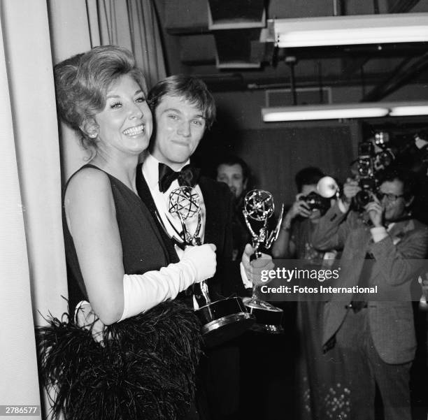 American actors Michael Learned and Richard Thomas each hold their Emmy Awards for Outstanding Continued Performance in a Leading Role, Hollywood,...