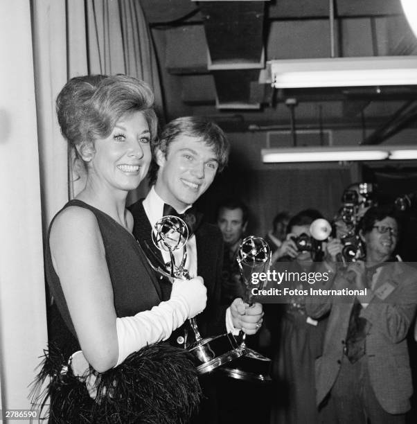 American actors Michael Learned and Richard Thomas each hold their Emmy Awards for Outstanding Continued Performance in a Leading Role, Hollywood,...