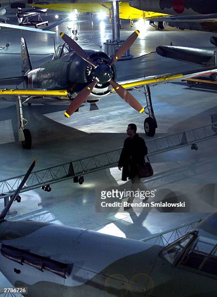 Member of the media walks through the new Steven F. Udvar-Hazy Center, the SmithsonianÕs new addition to the National Air and Space Museum December...