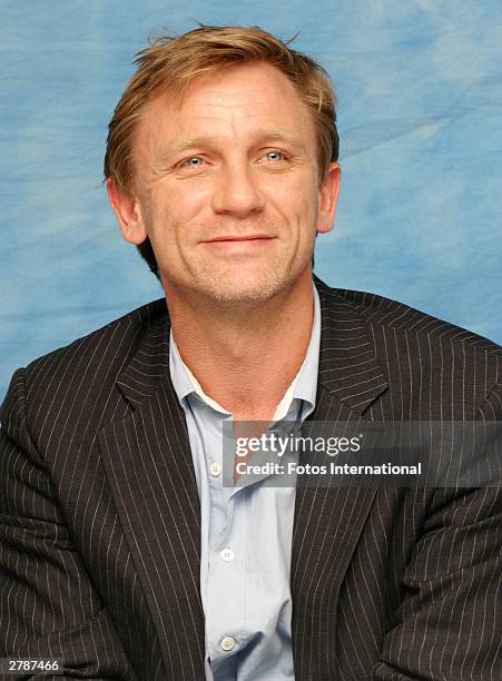 Actor Daniel Craig answers questions from the press at a junket for his new film "Sylvia" at the Dorchester Hotel October 13, 2003 in London, England.