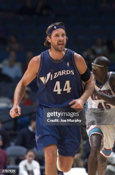 Christian Laettner of the Washington Wizards yells after making a shot against the Memphis Grizzlies December 5, 2003 at the Pyramid Arena in...