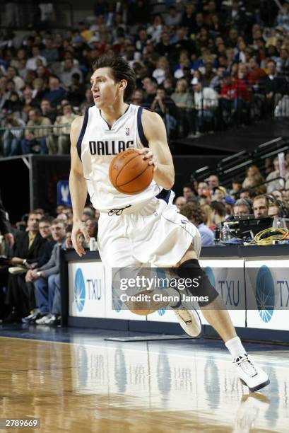 Eduardo Najera of the Dallas Mavericks dribbles against the Orlando Magic December 6, 2003 at the American Airlines Center in Dallas, Texas. NOTE TO...