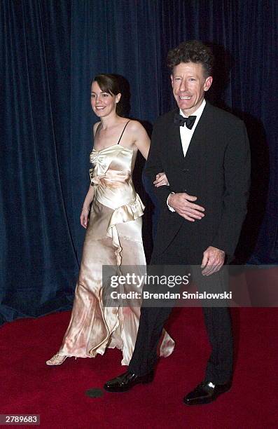 Lyle Lovett and April Kimble arrive at the United States State Department for a dinner in Washington Saturday, December 6, 2003 evening preceding...