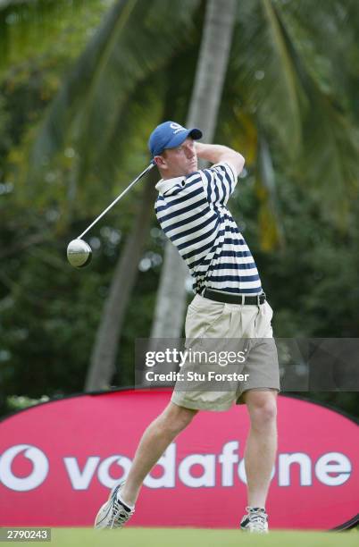 England batsman Paul Collingwood tees off on the first during the Vodafone England Cricketers Golf day at the Victoria Golf club on December 7, 2003...