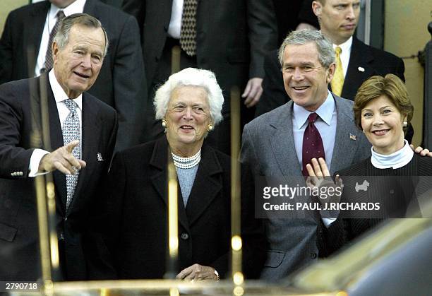 Former US President George H.W. Bush and his wife Barbara leave St. John's Episcopal Church with their son US President George W. Bush and his wife...