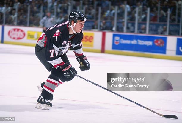 Center Wayne Primeau of the Buffalo Sabres moves down the ice during a game against the Anaheim Mighty Ducks at Arrowhead Pond in Anaheim,...