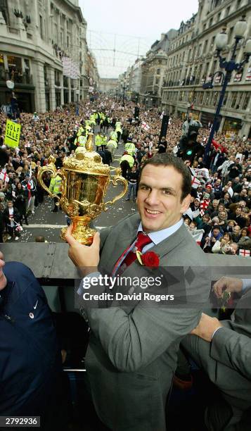 England captain Martin Johnson with the Webb Ellis Cup during the England Rugby World Cup team victory parade December 8, 2003 in London. Up to half...