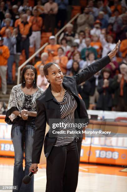 Tamika Catchings waves to the crowd during a half-time ceremony retiring her college jersey December 7, 2003 at Thompson-Boling Arena in Knoxville,...