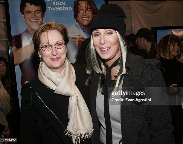 Singer/actress Cher and actress Meryl Streep arrive at the 20th Century Fox film premiere of "Stuck On You" December 8, 2003 in New York City.