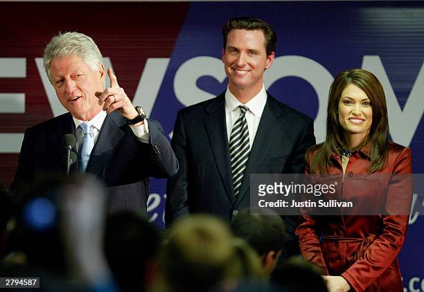 Former U.S. President Bill Clinton speaks at a campaign rally for San Francisco mayoral candidate Gavin Newsom as Newsom's wife Kimberly...
