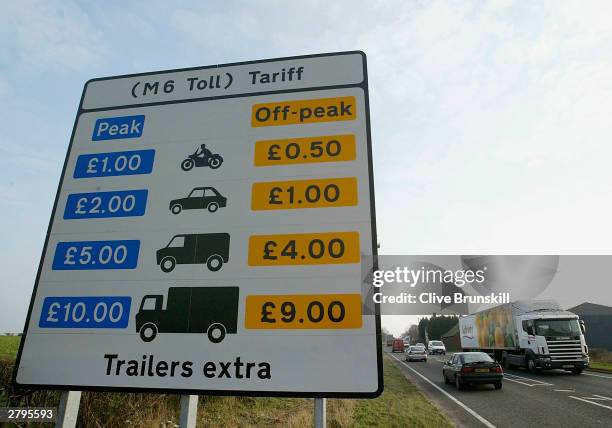 Toll price sign is seen at the new M6 motorway on December 9, 2003 in Birmingham, England. This marks the opening of the first phase of the dual...