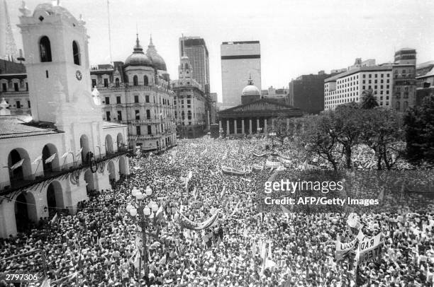 The crowd fills the Plaza de Mayo 10 December, 1983 in Buenos Aires during the inauguration of President Raul Alfonsin. Argentina will celebrate on...
