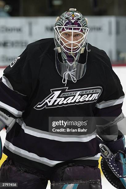 Goaltender J.S. Giguere of the Mighty Ducks of Anaheim warms up prior to taking on the Colorado Avalanche on November 18, 2003 at the Pepsi Center in...