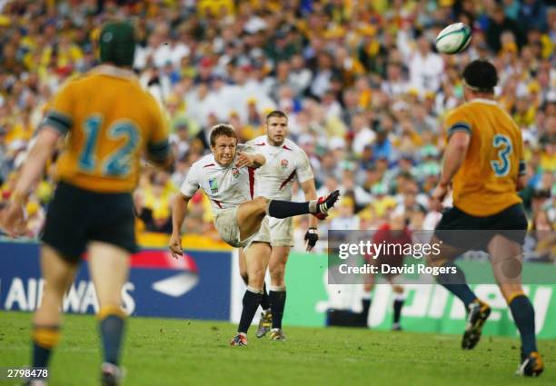 Jonny Wilkinson kicks the winning drop goal to give England victory in extra time during the Rugby World Cup Final between Australia and England held...