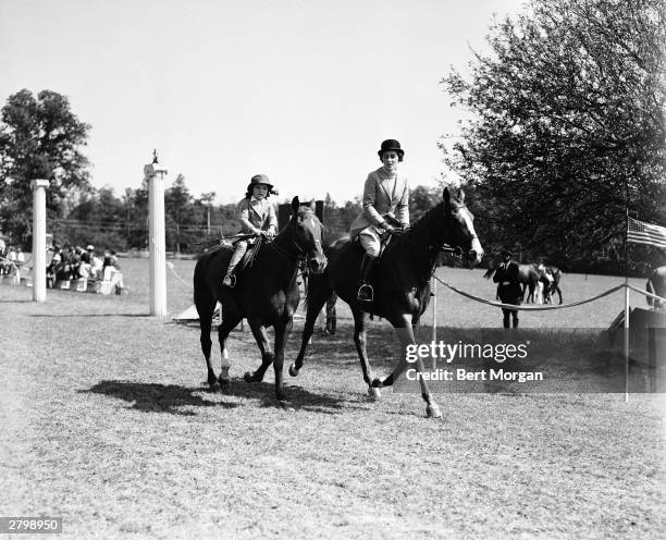 Jacqueline Bouvier and her mother, Janet Lee Bouvier, ride together at the Smithtown Horse Show, Long Island, New York, 1935.