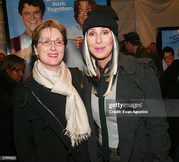 Actress Meryl Streep and singer/actress Cher arrive at the 20th Century Fox film premiere of "Stuck On You" December 8, 2003 in New York City.