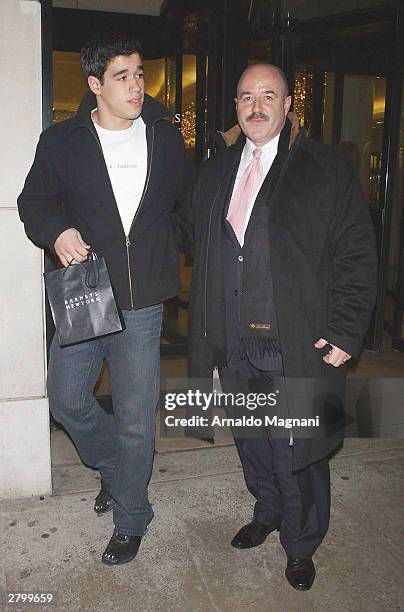 Former New York City Police Commissioner Bernard Kerik and his son exit Barneys November 26, 2003 in New York City.