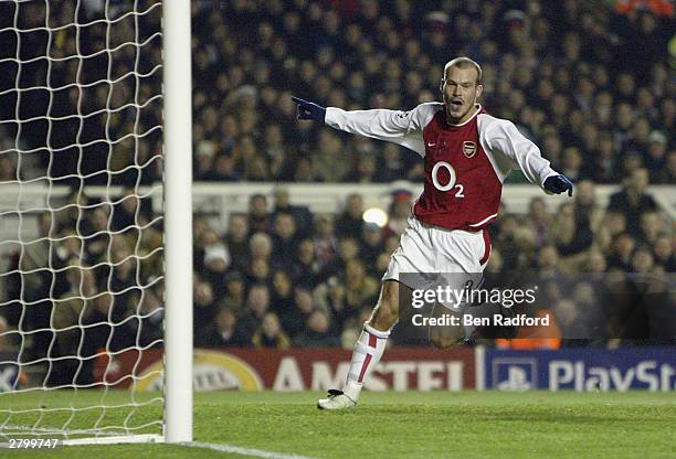 Fredrik Ljungberg of Arsenal celebrates scoring the second goal for Arsenal during the UEFA Champions League Group B match between Arsenal and...