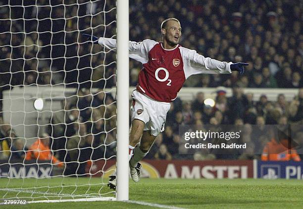 Fredrik Ljungberg of Arsenal celebrates scoring the second goal for Arsenal during the UEFA Champions League Group B match between Arsenal and...