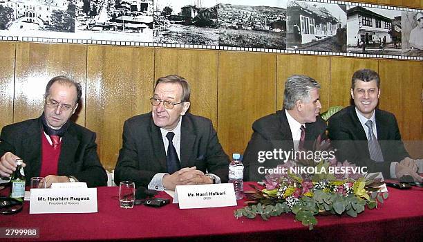 Kosovo President Ibrahim Rugova, UN chief in Kosovo Finnish Harri Holker, Kosovo Prime Minister Bajram Rexhepi and former Kosovo Albanian rebel...