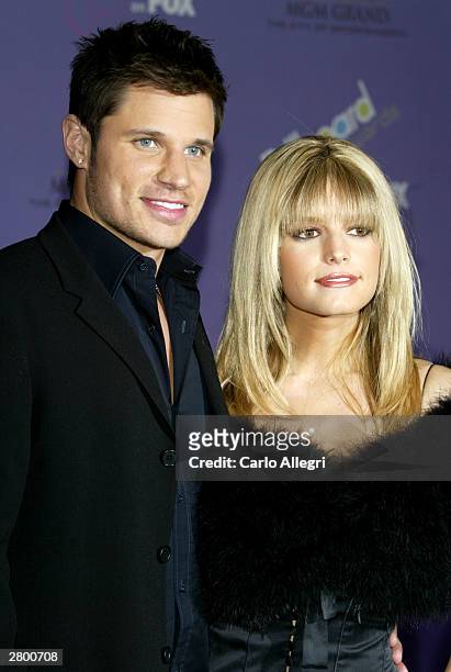 Singers Nick Lachey and Jessica Simpson attend the 2003 Billboard Music Awards at the MGM Grand Garden Arena December 10, 2003 in Las Vegas, Nevada....