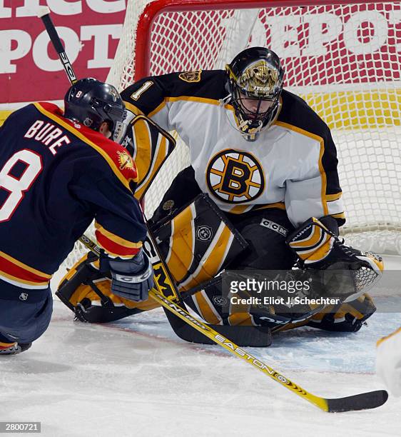 Right wing Valeri Bure of the Florida Panthers scores a goal against Goalie Andrew Raycroft of the Boston Bruins in NHL action on December 10, 2003...